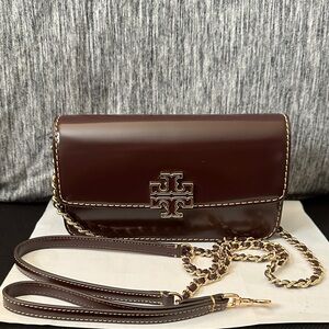 Tory Burch Britten Smooth Chain Wallet with shoulder strap and wristlet strap.